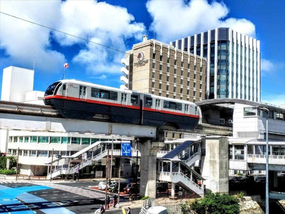 かりゆしコンドミニアムリゾート那覇スカイリビングホテル旭橋駅前 Naha Buitenkant foto