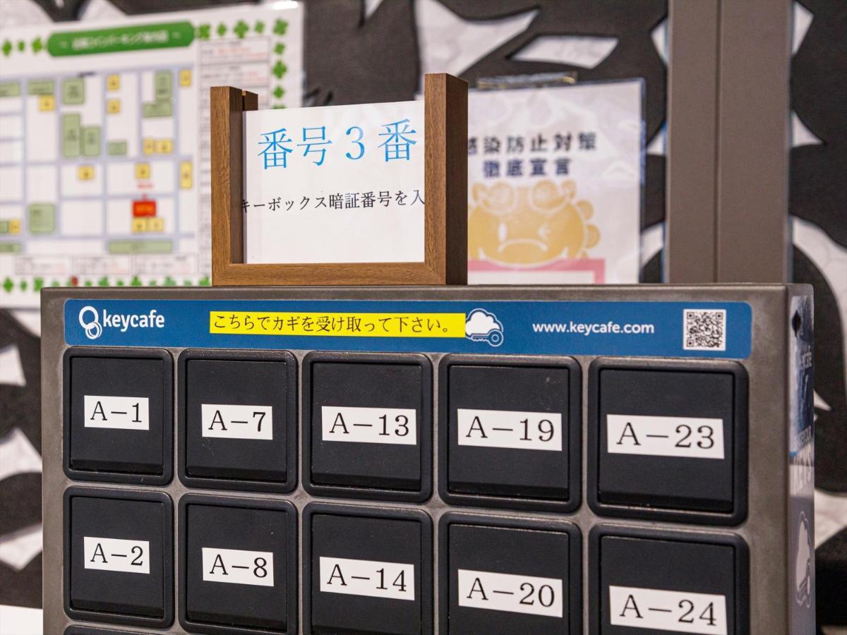 かりゆしコンドミニアムリゾート那覇スカイリビングホテル旭橋駅前 Naha Buitenkant foto