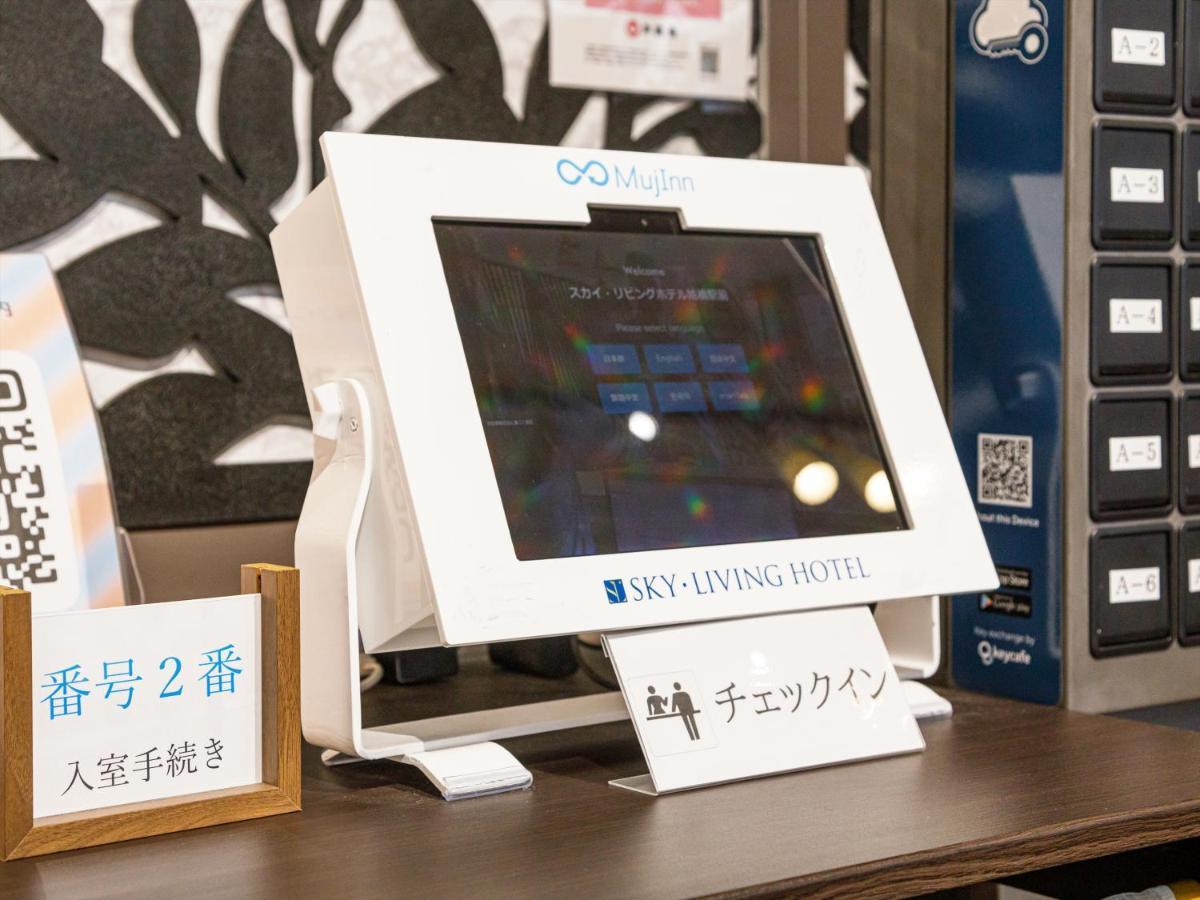 かりゆしコンドミニアムリゾート那覇スカイリビングホテル旭橋駅前 Naha Buitenkant foto