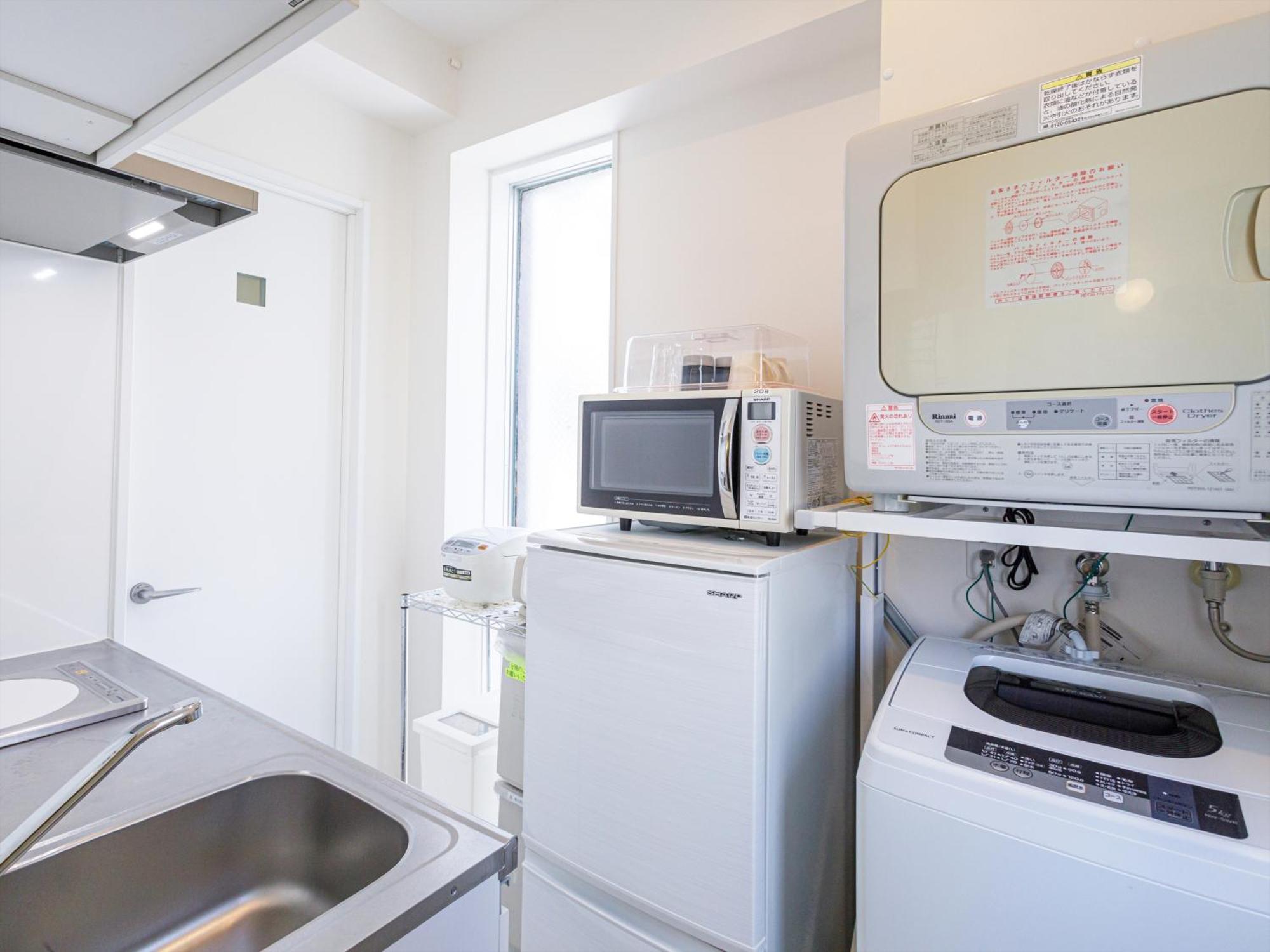 かりゆしコンドミニアムリゾート那覇スカイリビングホテル旭橋駅前 Naha Kamer foto